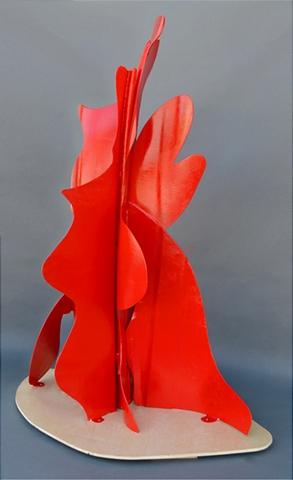 At 6' tall, Flicker by Larry Brown is painted red and ready to be installed.