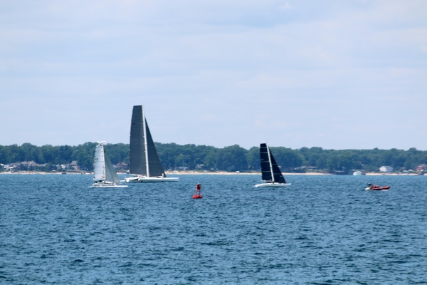 Adagio leading the pack at the start of the race. Strings, another Gougeon built boat, shown in third would finish second in the multihull division.