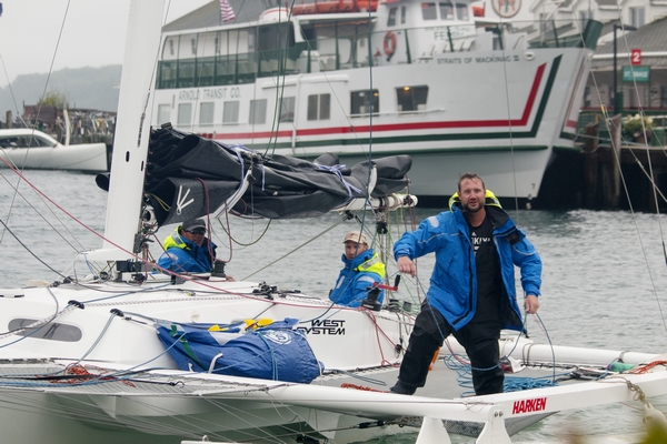 (L to R) Alan Gurski, Matt Scharl and Ben Gougeon crewed Adagio to victory in the Division III, Cove Island Multihull fleet of the 2016 Bell's Beer Bayview Mackinac Race.