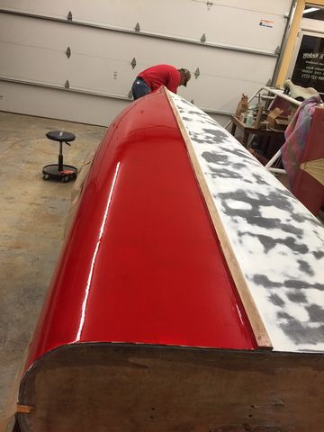You can see the faired final coat of 105/206/410 to the right of the keel of the Cadillac Runabout. Being applied to the left is the red enamel bottom paint.