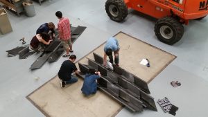 students assemble columns