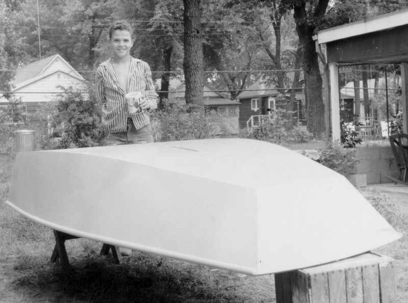 The plywood sharpie is Captain JR Watson's latest boat. Here he is with a plywood dinghy at age 12.