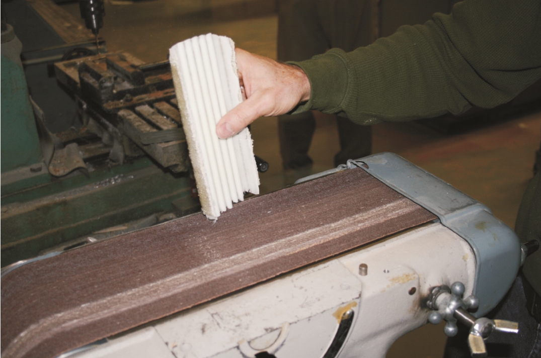 Before using the mold, trim the excess off with a band saw and smooth ragged edges with a belt sander.