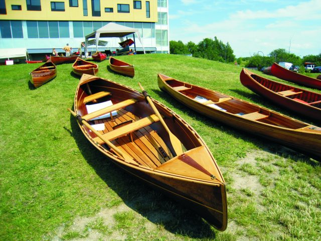 Both wood/epoxy and traditionally built canoes and kayaks were on display.