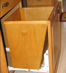 The finished custom wastebasket fits perfectly in the drawer.