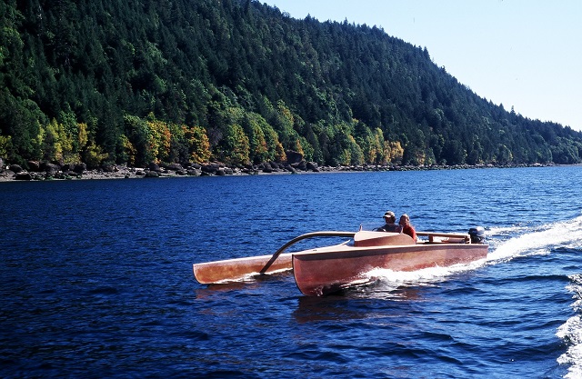 Single Outrigger Motorboat by Russell Brown