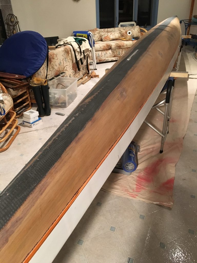 I added additional longitudinal stability with a single layer of 6″ unidirectional carbon tape running the length of the boat along the centerline below the keelson. - Epoxyworks #60, Spring 2025.